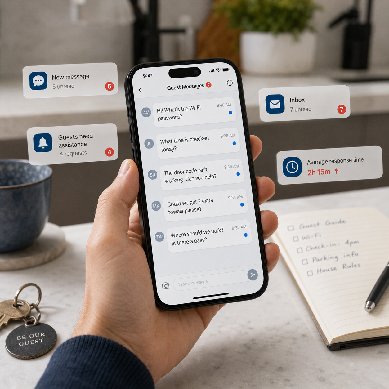 Hand holding a phone with multiple guest messages and unread notifications